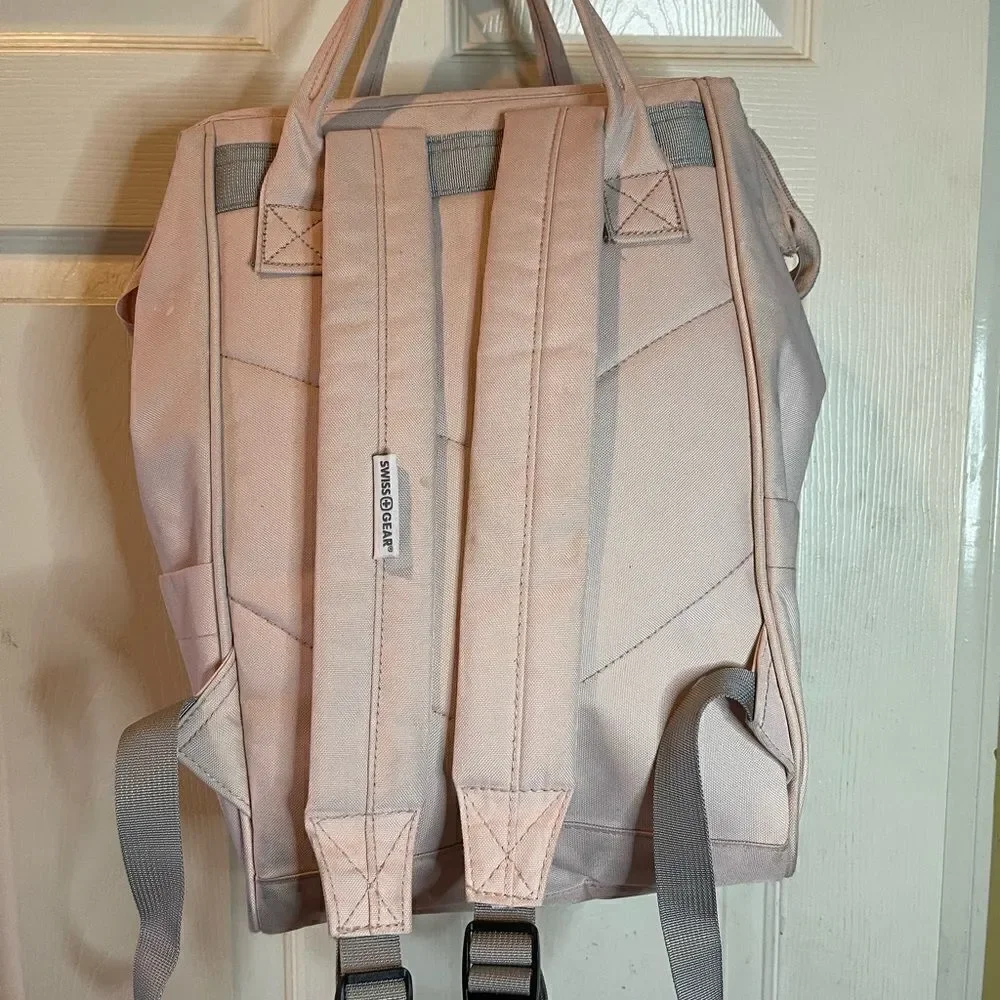 Swiss Gear light pink canvas multi purpose backpack with Rose gold Hardw…